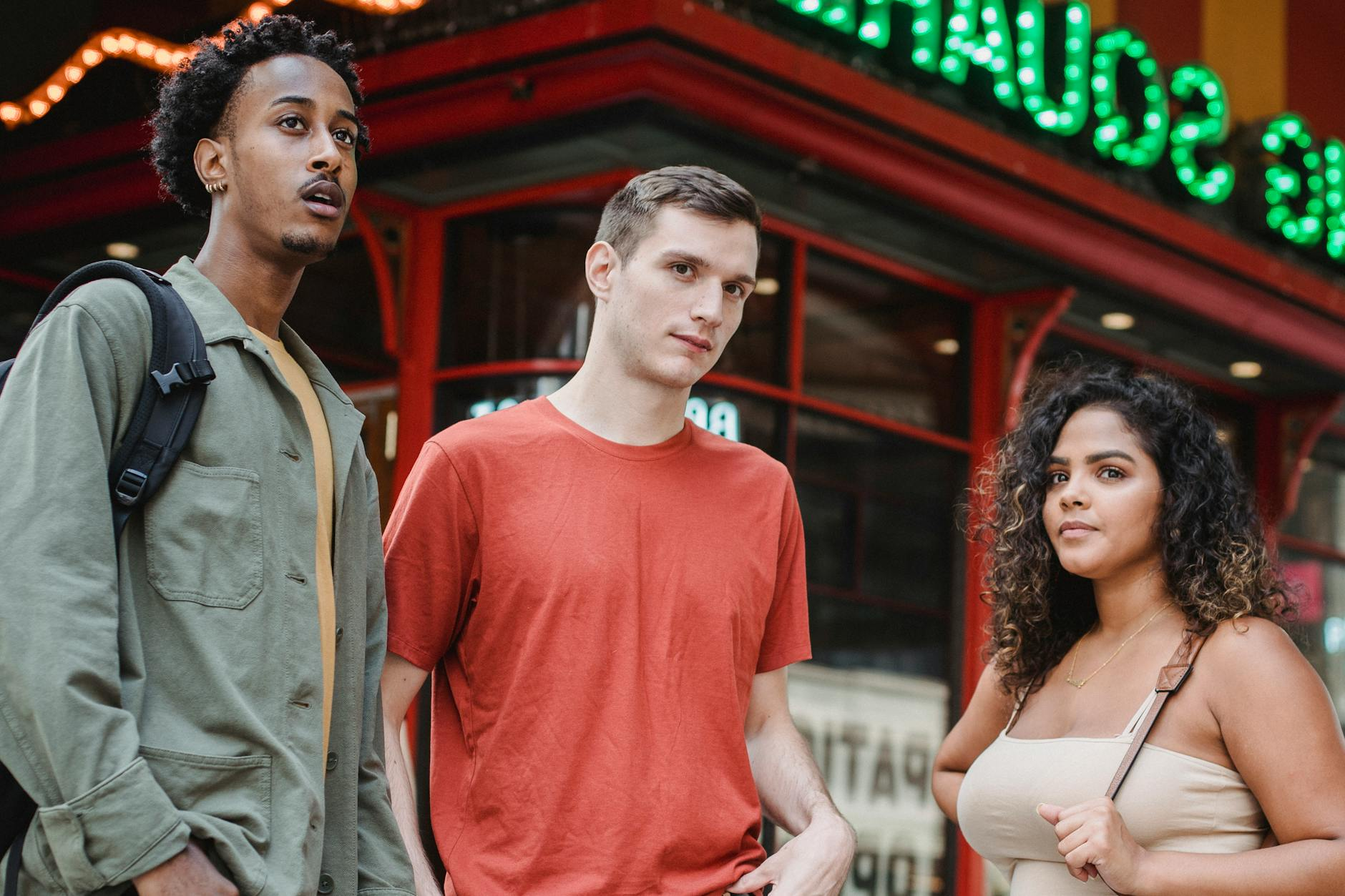 group of multiethnic friends standing on street